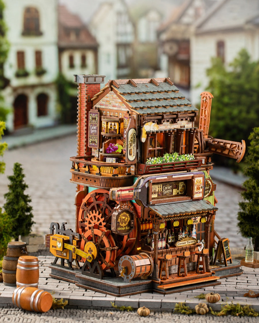 A mechanical tavern model with exposed wooden gears