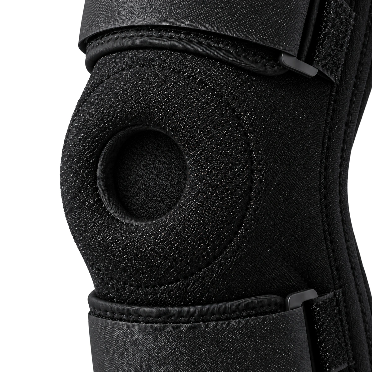 Close-up of the cushioned patella opening with black fabric visible behind it